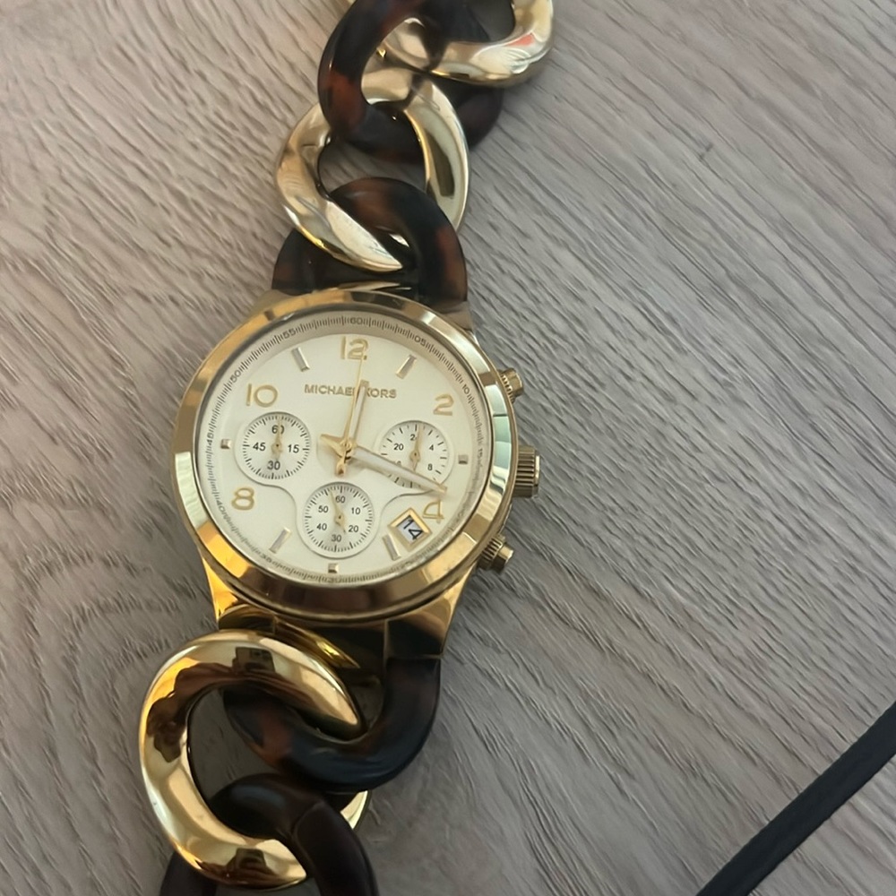 Tortious and gold Micheal Kora watch